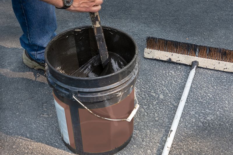 Local Blacktop Sealing pros at work
